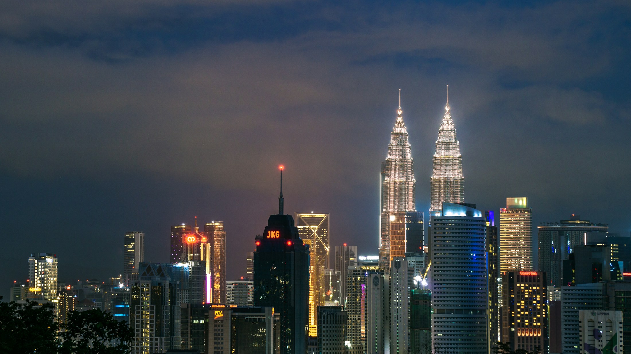 Kuala Lumpur and the Petronas Twin Towers illuminated at night